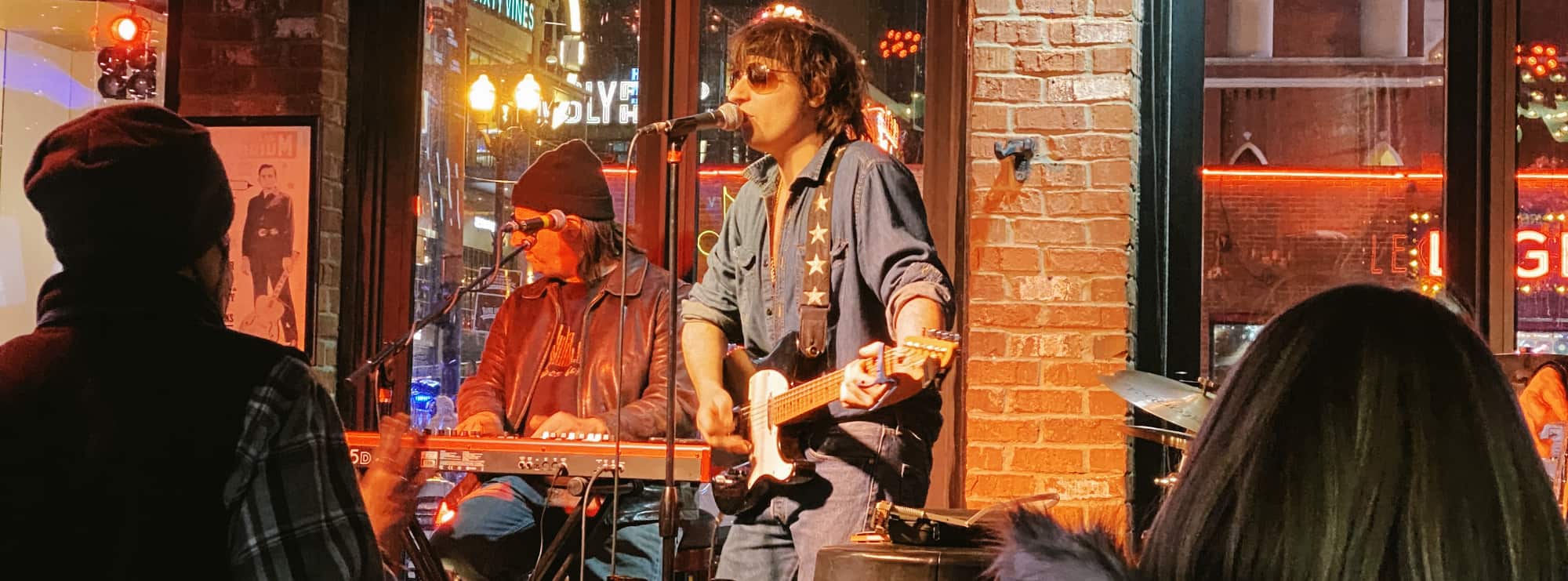 bar singer on guitar in McAllen